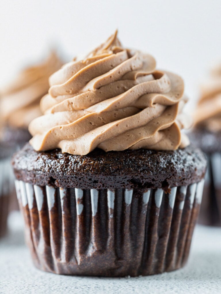 chocolate cupcake topped with chocolate frosting