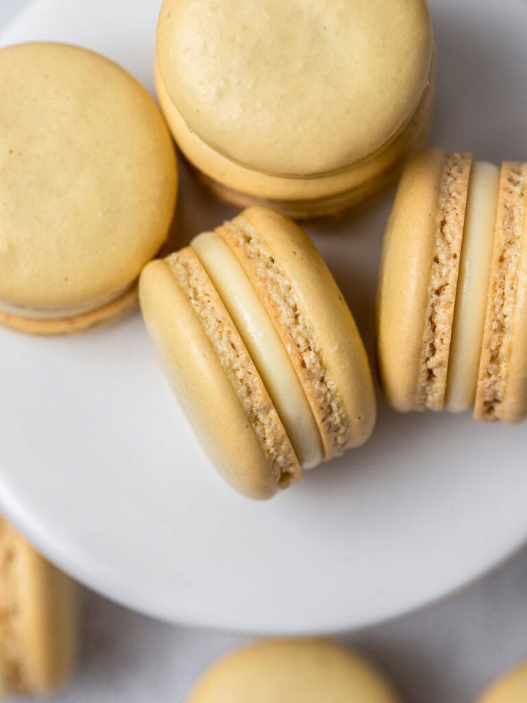 lemon macarons laid out on a plate