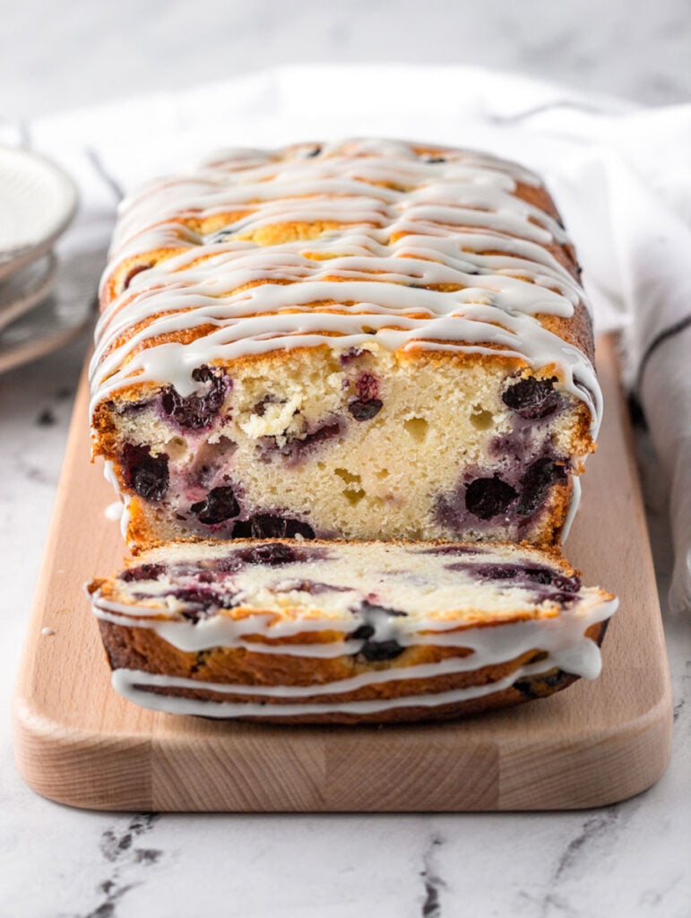 a slice of blueberry lemon bread cut out showing the center