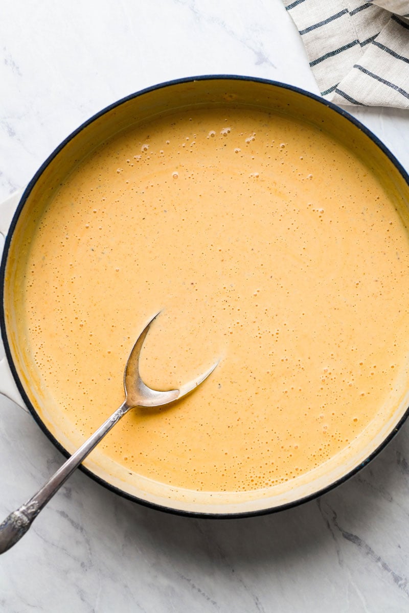 cajun cheese sauce in a skillet