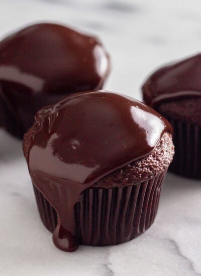 chocolate ganache topped on a cupcake