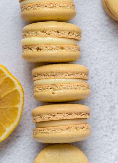 lemon macarons stacked on top of one another