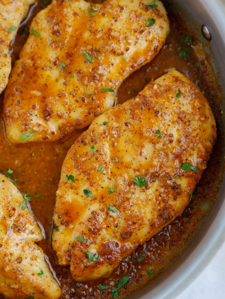 Close up of honey mustard chicken.