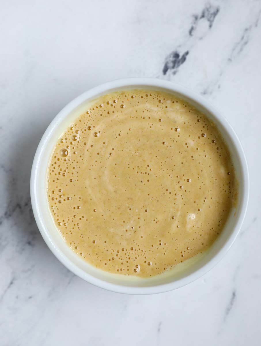 Banana baked oats batter in a ramekin.