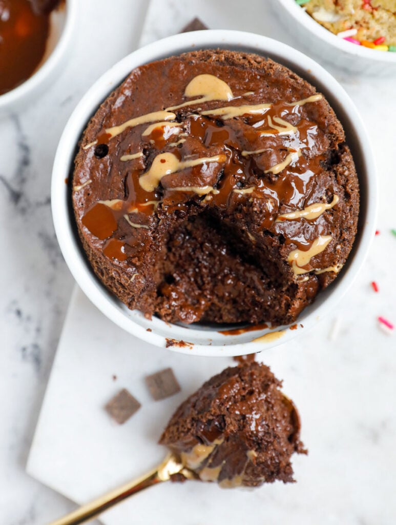 Chocolate PB baked oats with a spoonful scooped out.