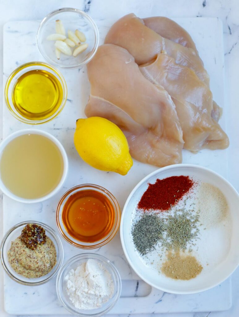 Overhead image of ingredients needed to make honey mustard chicken.