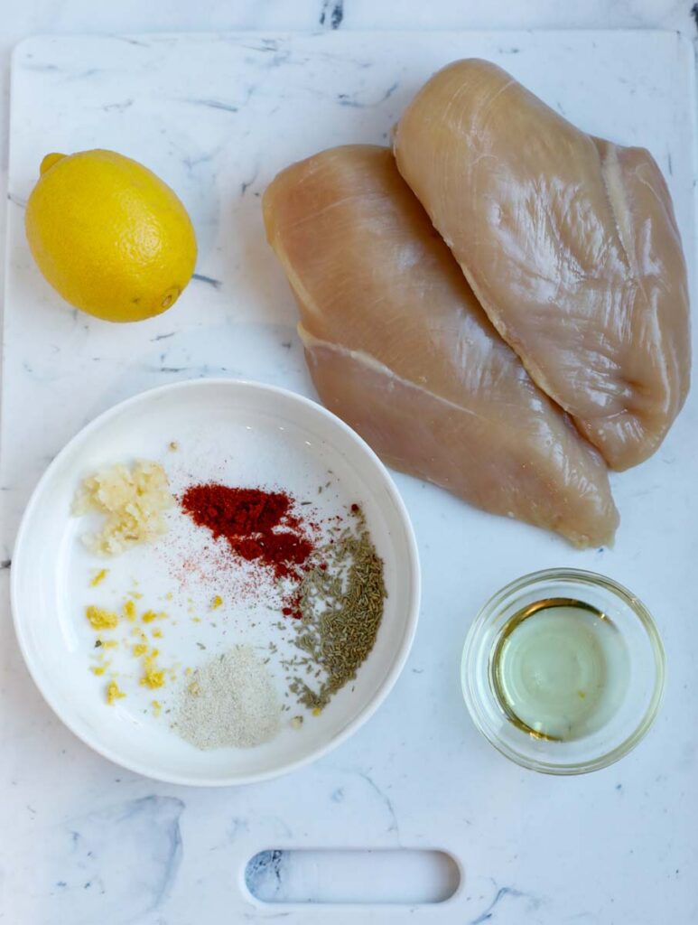 Ingredients needed to make air fryer rosemary chicken breast.