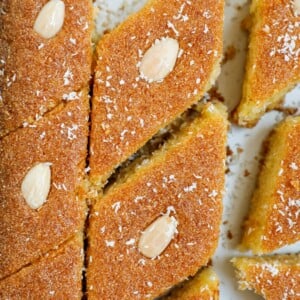 Close up of Coconut Basbousa cut into slices.