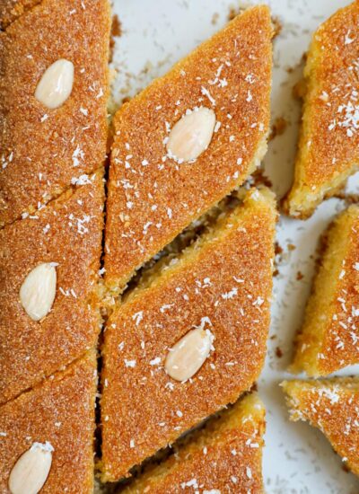 Close up of Coconut Basbousa cut into slices.