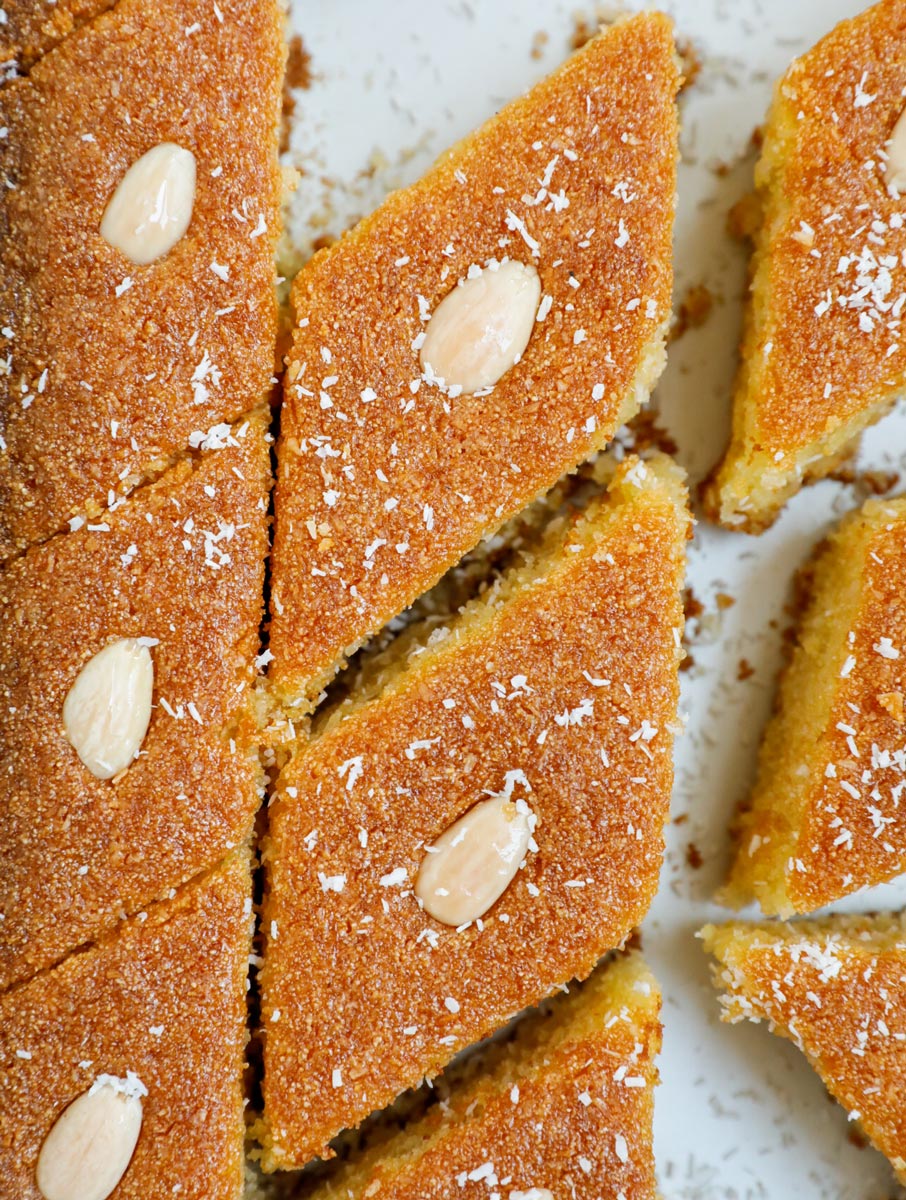 Close up of Coconut Basbousa cut into slices.