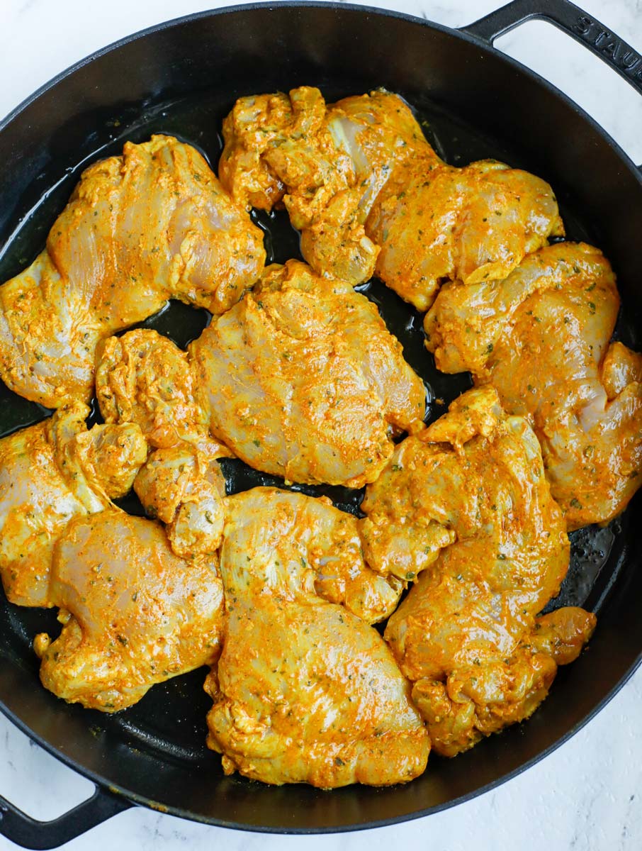 Chicken shawarma in a cast iron before cooking