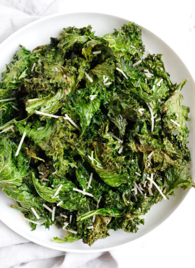Crispy kale chips in a plate.
