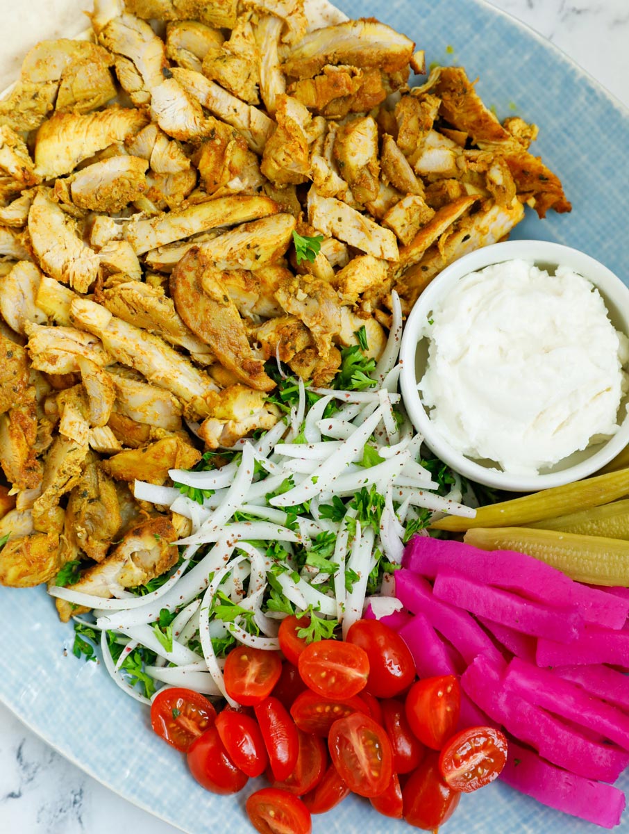 Close up of a platter of chicken shawarma recipe.