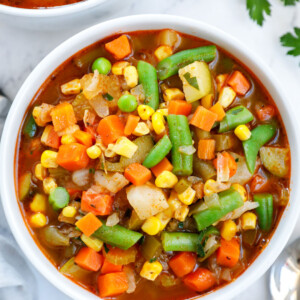 Overhead view of a bowl of vegetables soup.