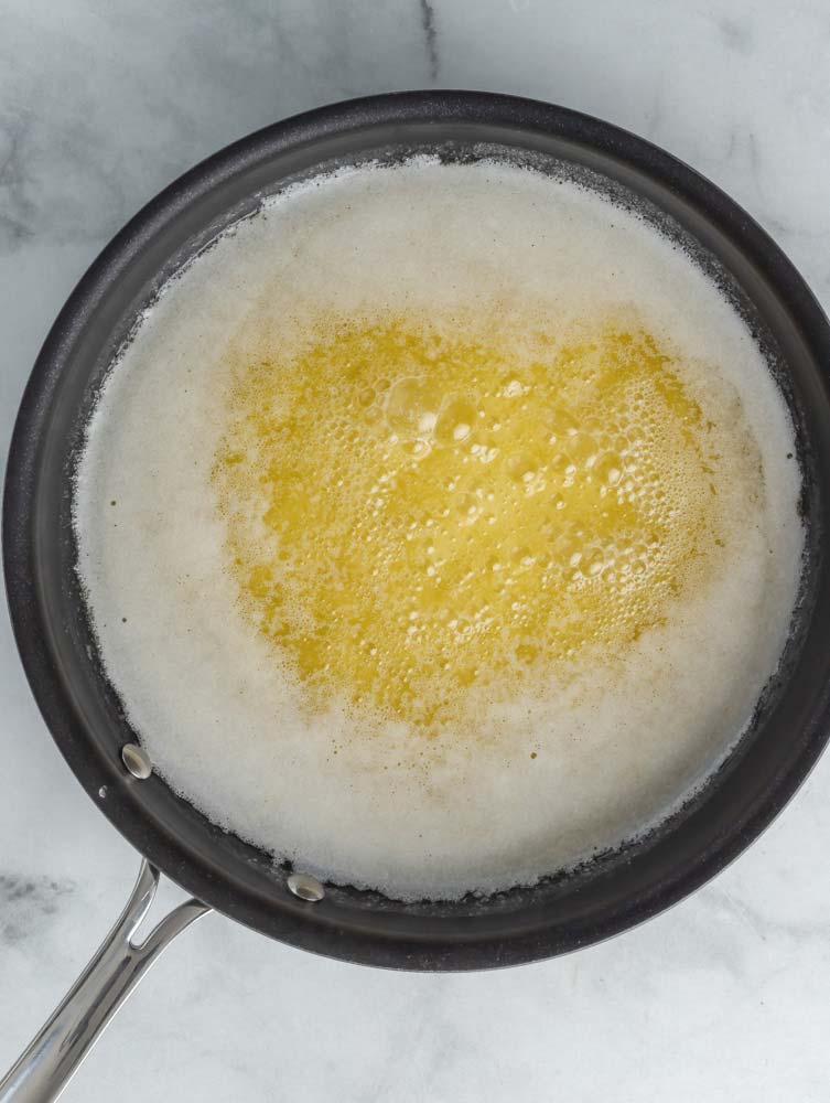 Melted butter, simmering.