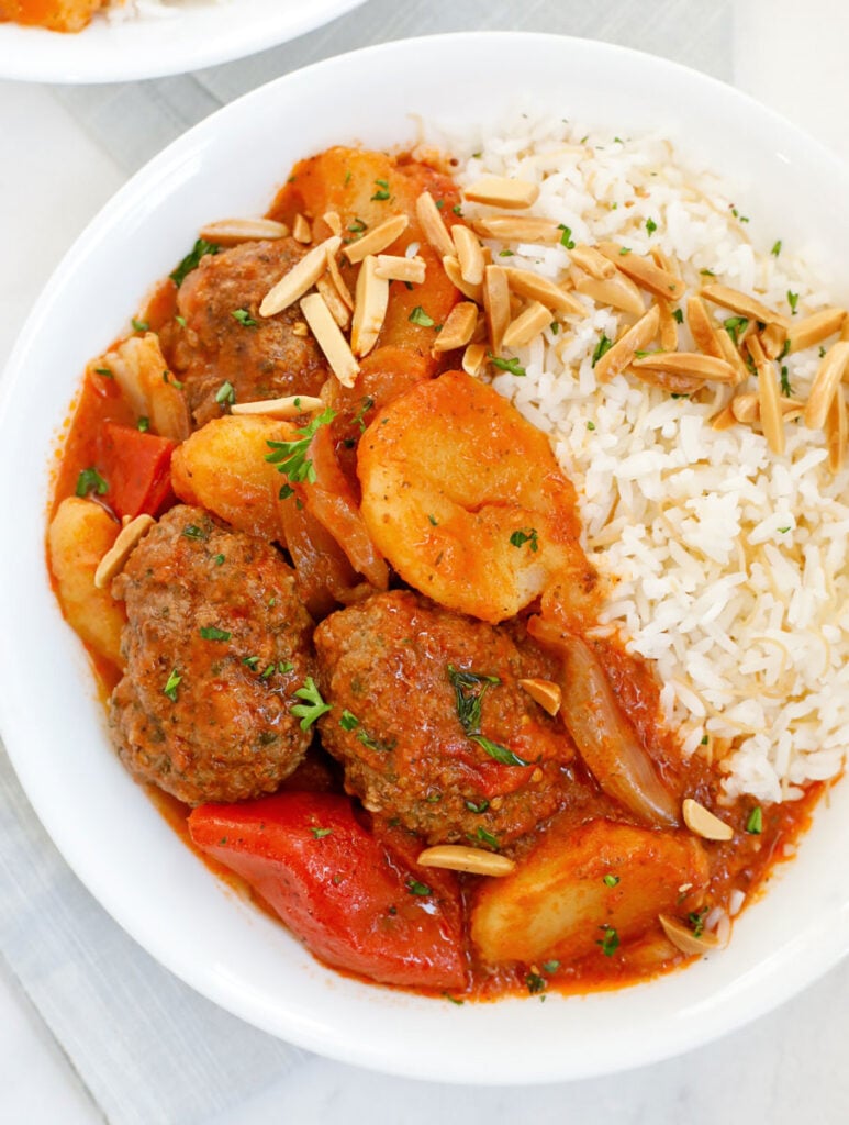 Kafta and potato stew served with vermicelli rice.