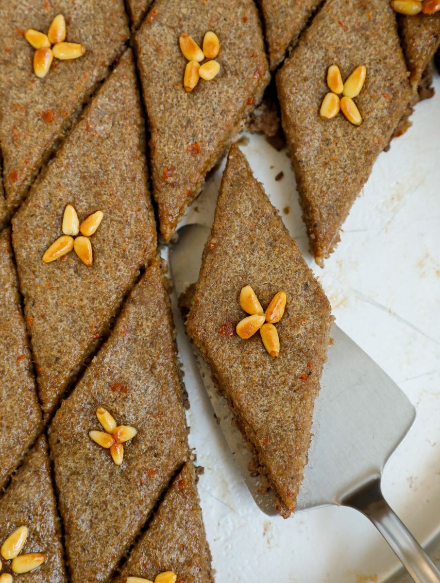 top down final shot of baked kibbeh showing one piece of kibbeh