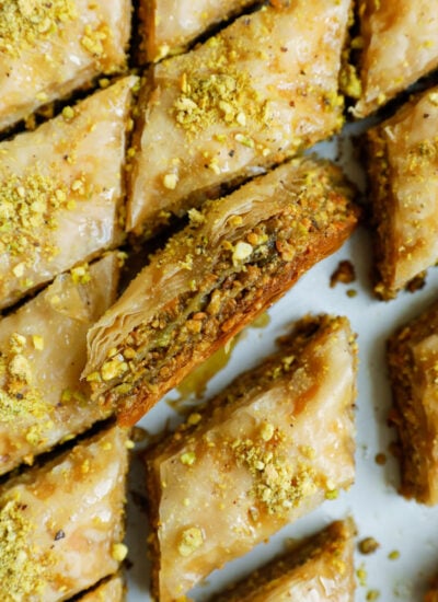 The inside of pistachio baklava, showing the layers of pastry.