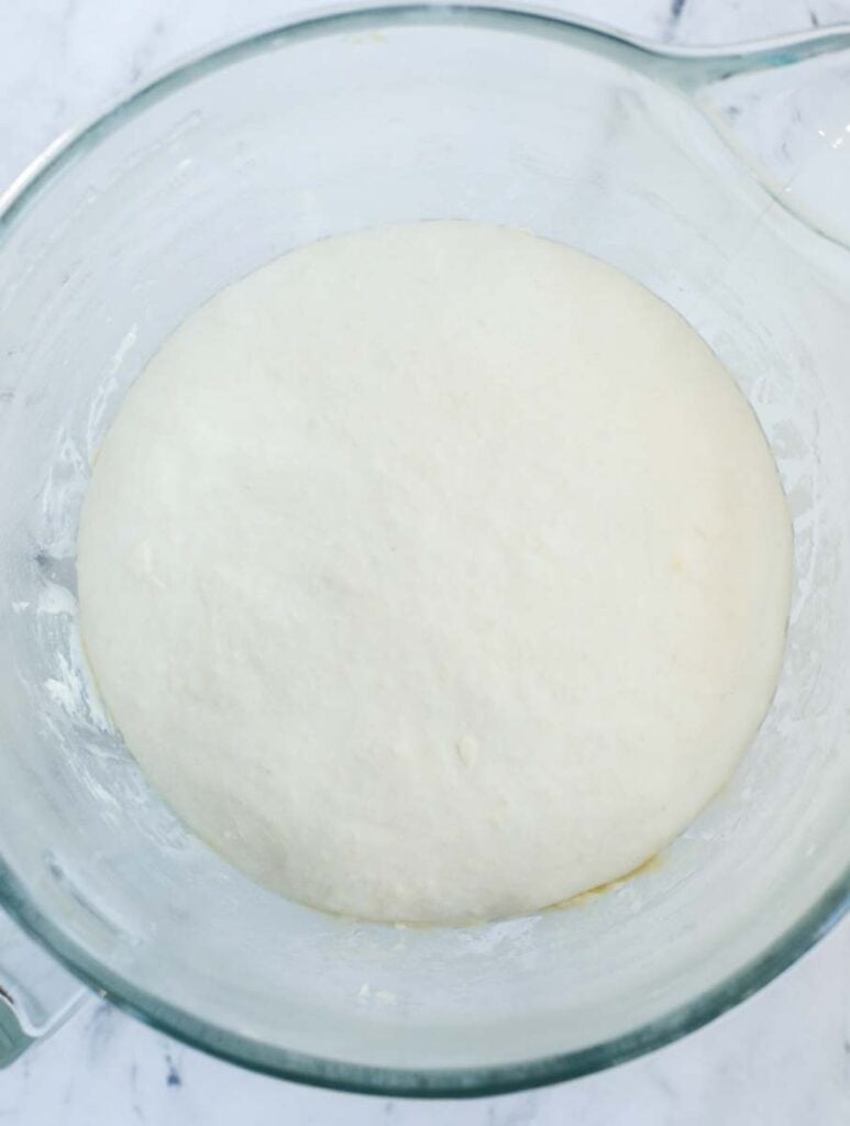 Dough rising in a bowl.