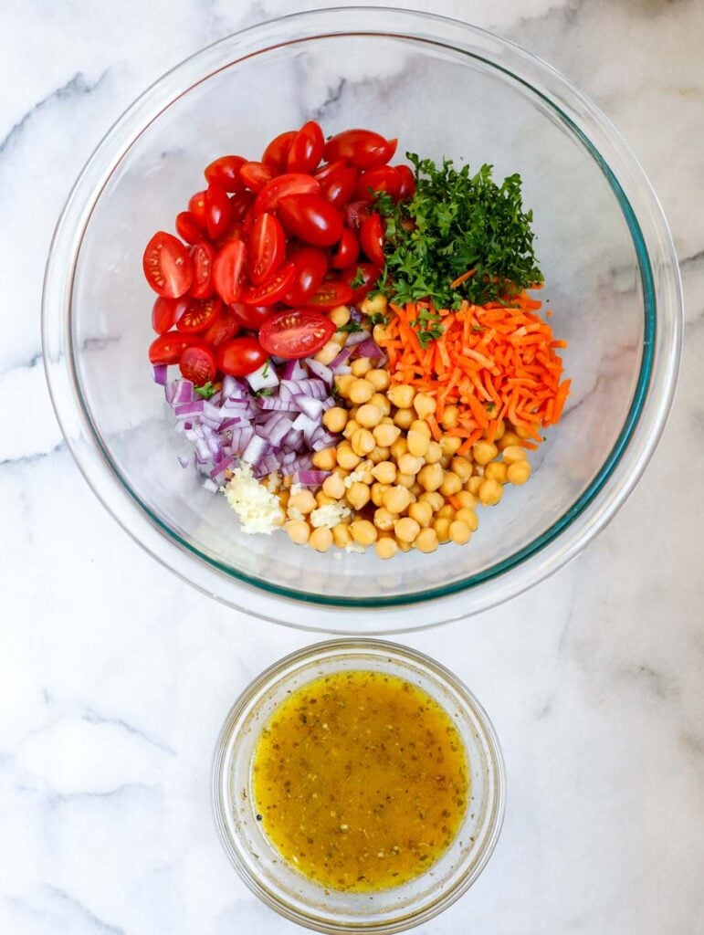 Ingredients needed to make spinach chickpea salad.