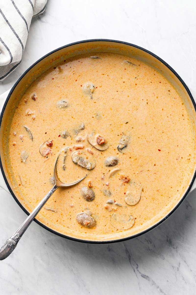 creamy mushroom sauce in a skillet