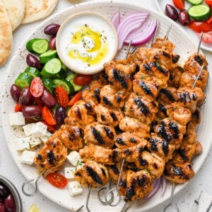 top down shot of the lemon garlic chicken skewers styled on a plate