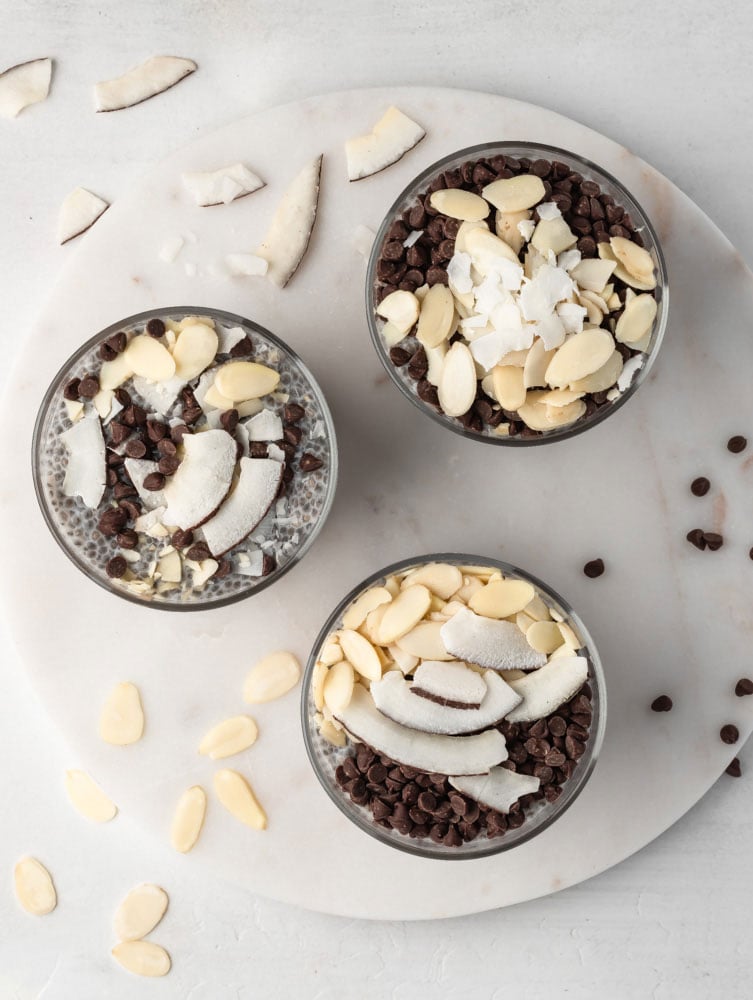 top down view shot of almond chia pudding in 3 cups