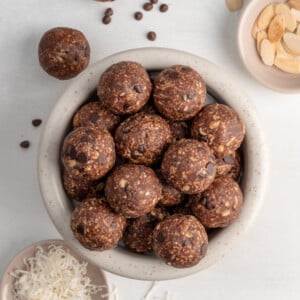 top down shot of almond joy energy balls in a bowl