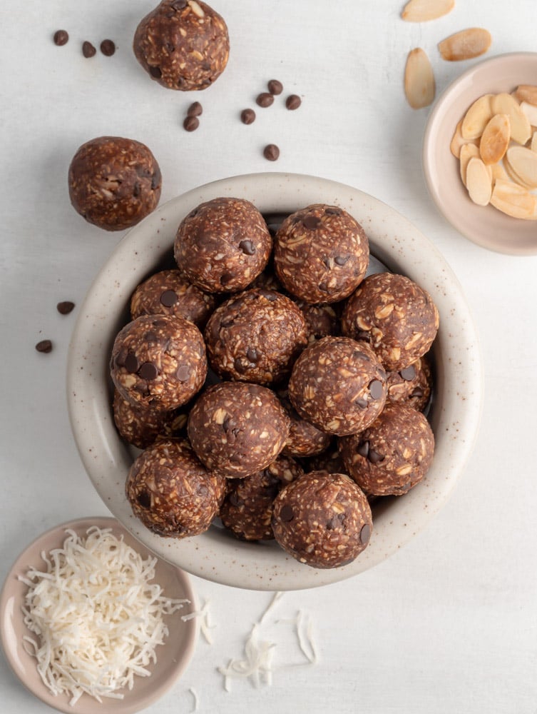 top down shot of almond joy energy balls in a bowl