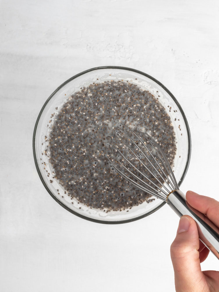 chia seed being mixed in a bowl