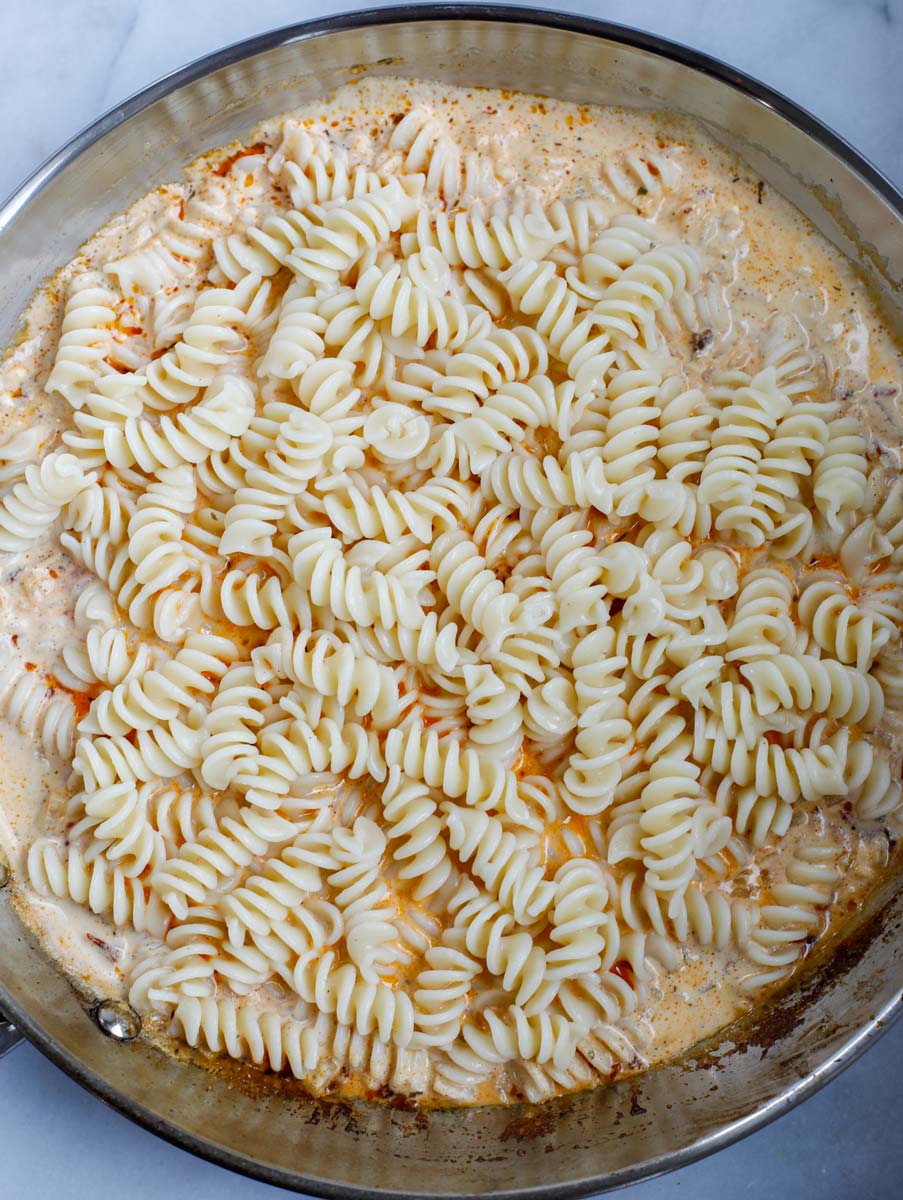 Pasta added to a creamy cajun sauce.