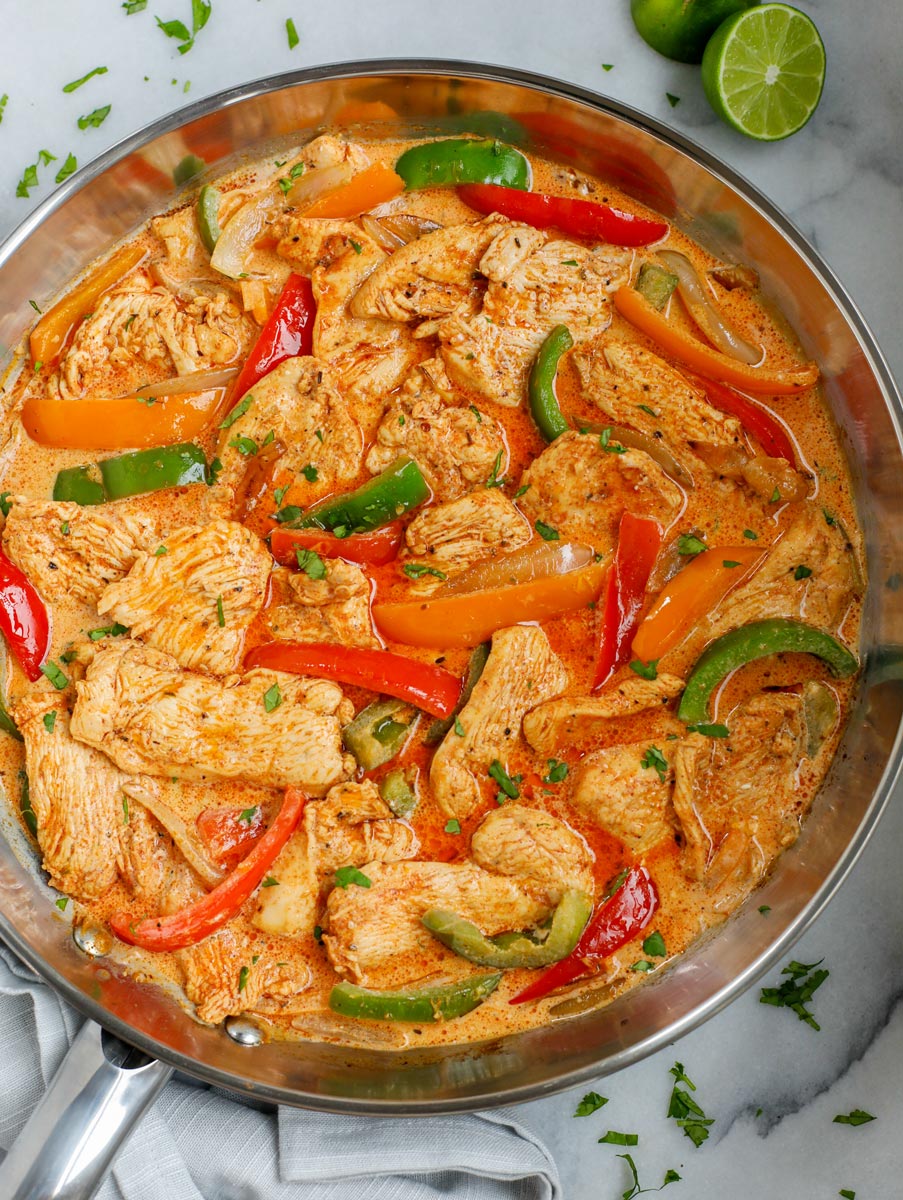 Overhead view of a pan of creamy chicken fajita skillet.