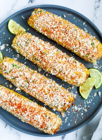 Mexican street corn on a plate.