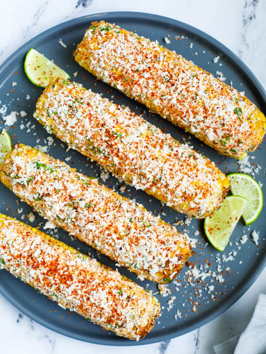 Mexican street corn on a plate.