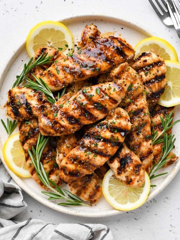 Overhead view of a plate of grilled honey mustard chicken.