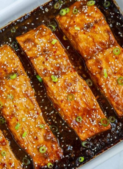 Baked teriyaki salmon in a baking dish.