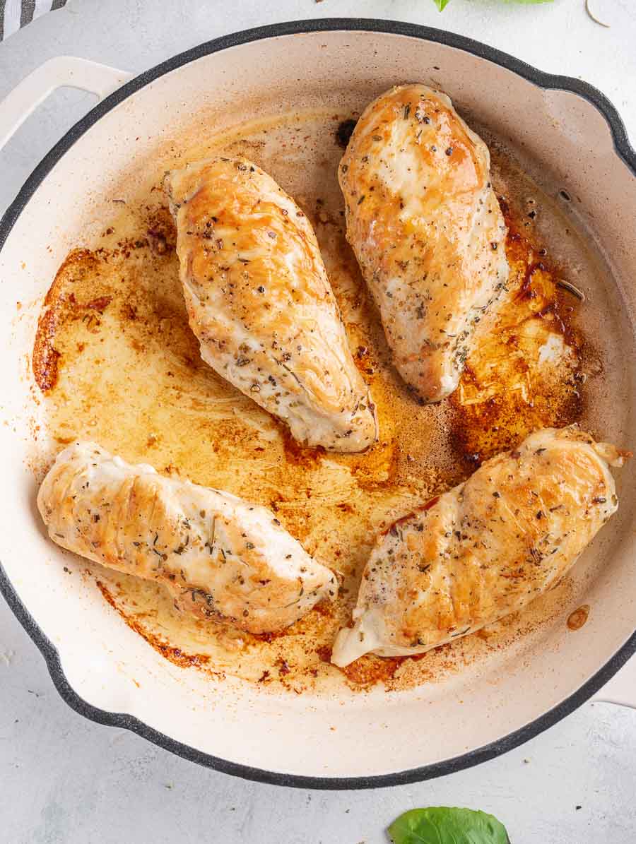 seared chicken in a skillet