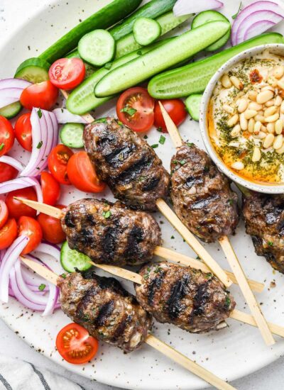 top down close up shot of the beef kofta on a plate with sides