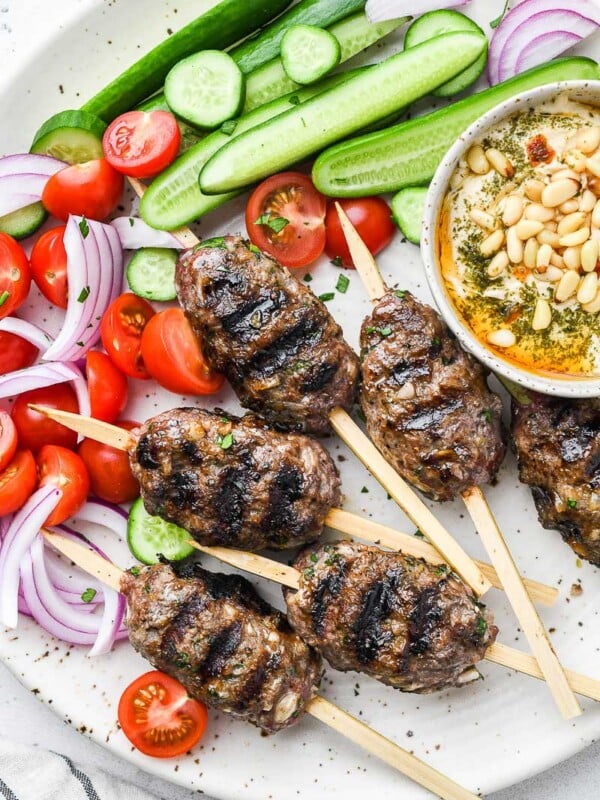 top down close up shot of the beef kofta on a plate with sides