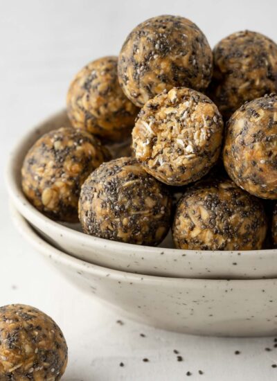 close up shot of half an energy bite in a bowl