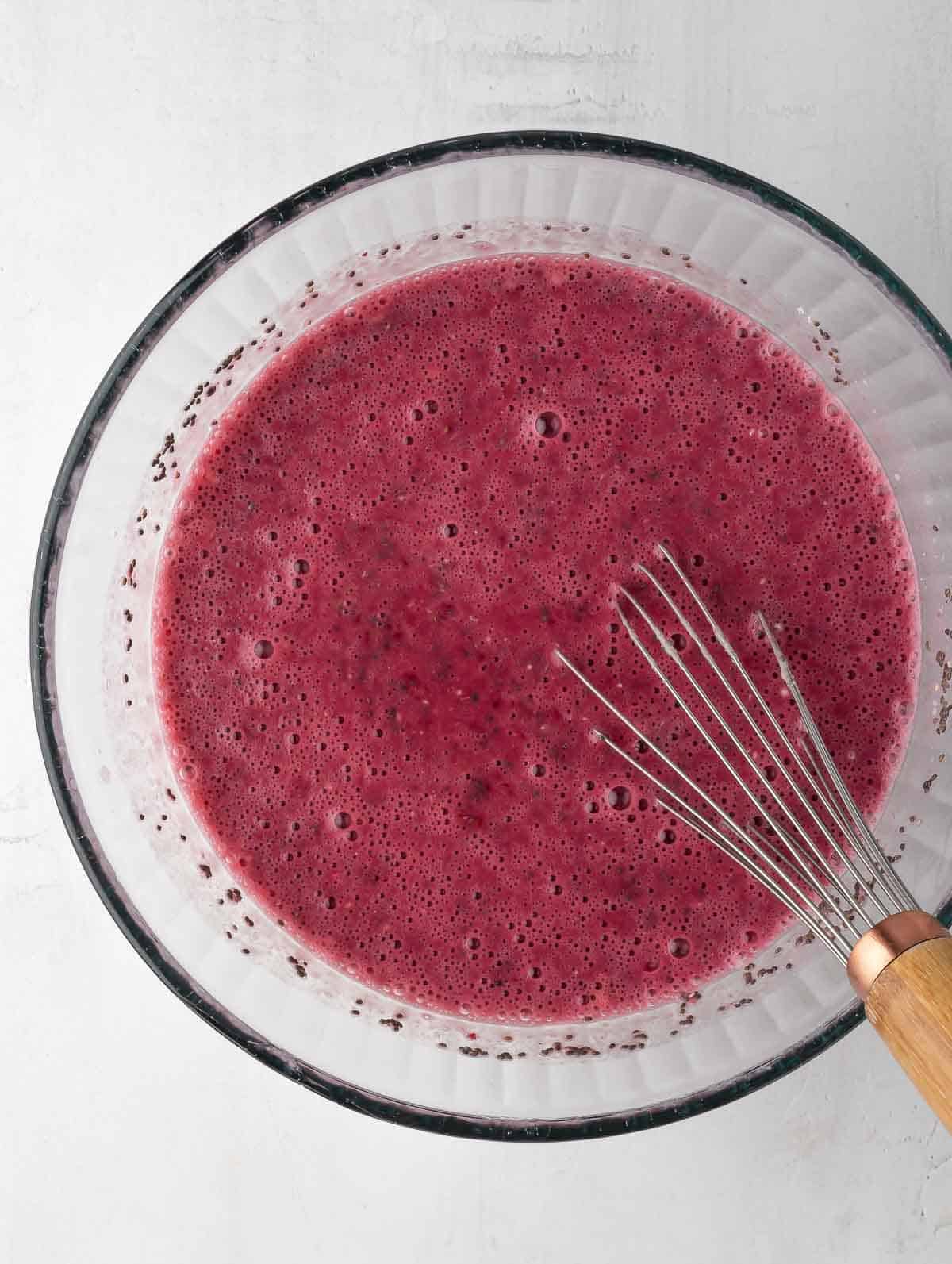 all ingredients mixed in a bowl with a whisk