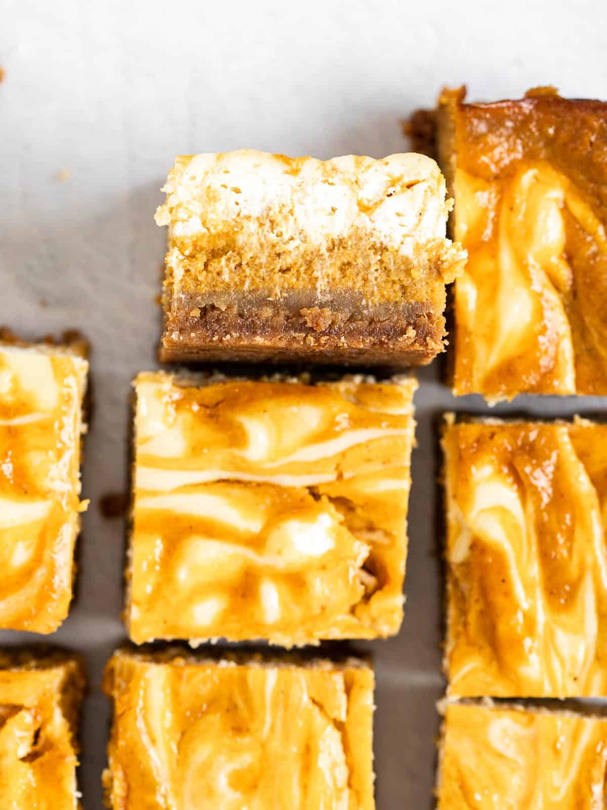 Cheesecake Swirled Pumpkin Bar flipped to show the center layers