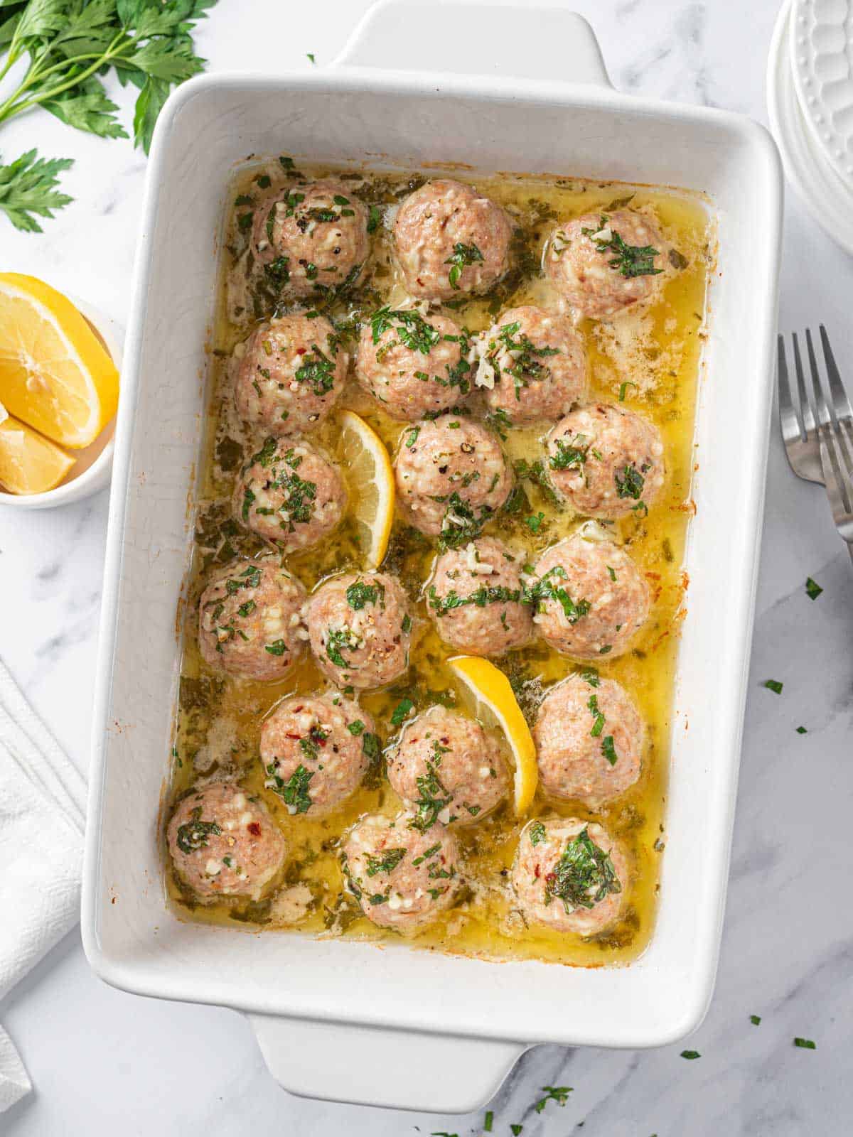 Garlic Butter Turkey Meatballs in a baking dish.