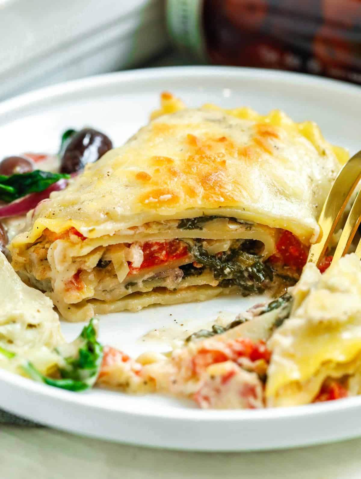 Greek White Alfredo Lasagna cut to show the center