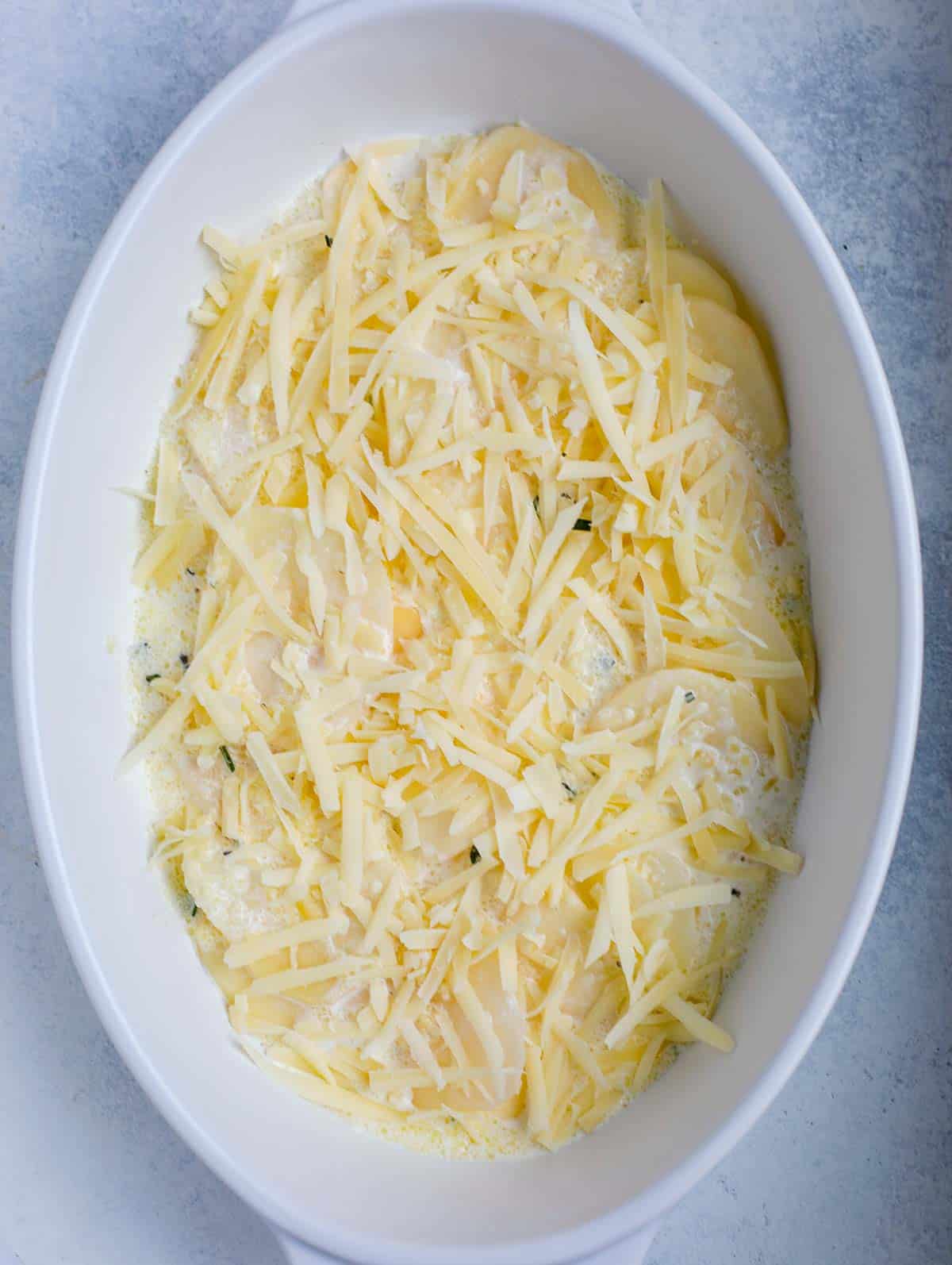 step showing how to assemble au gratin potato