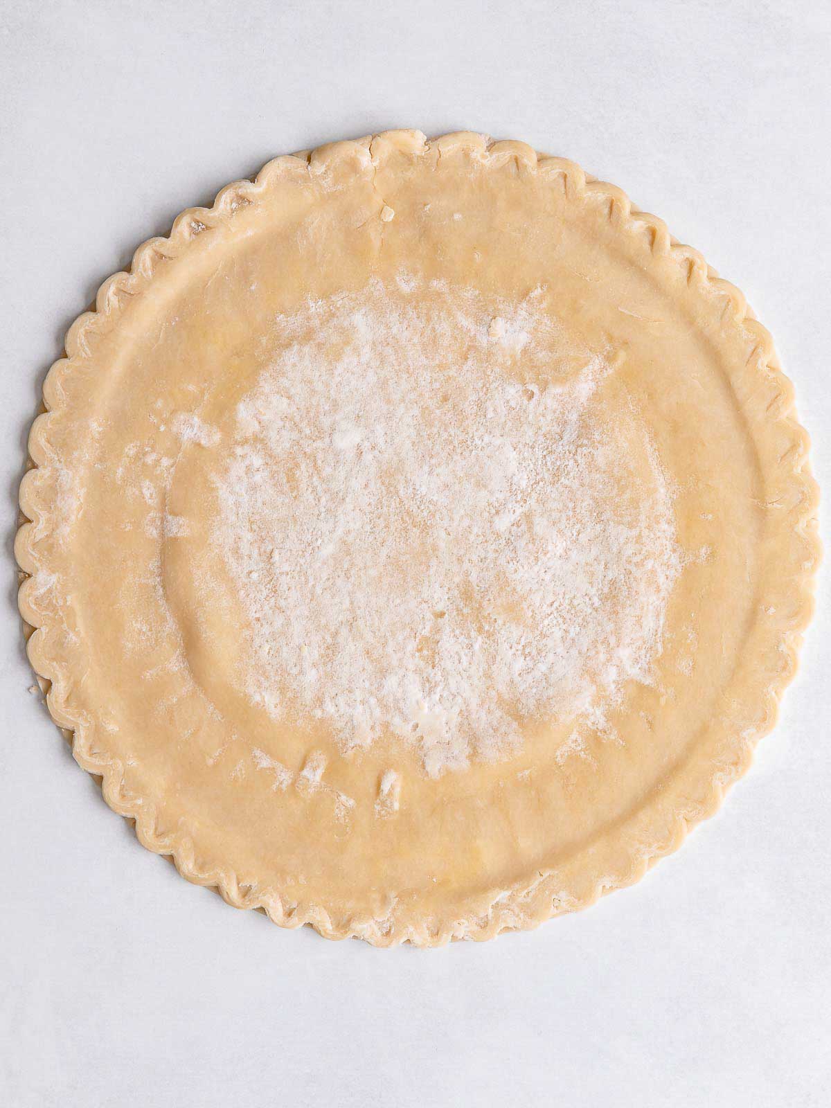 uncooked pie crust laid out