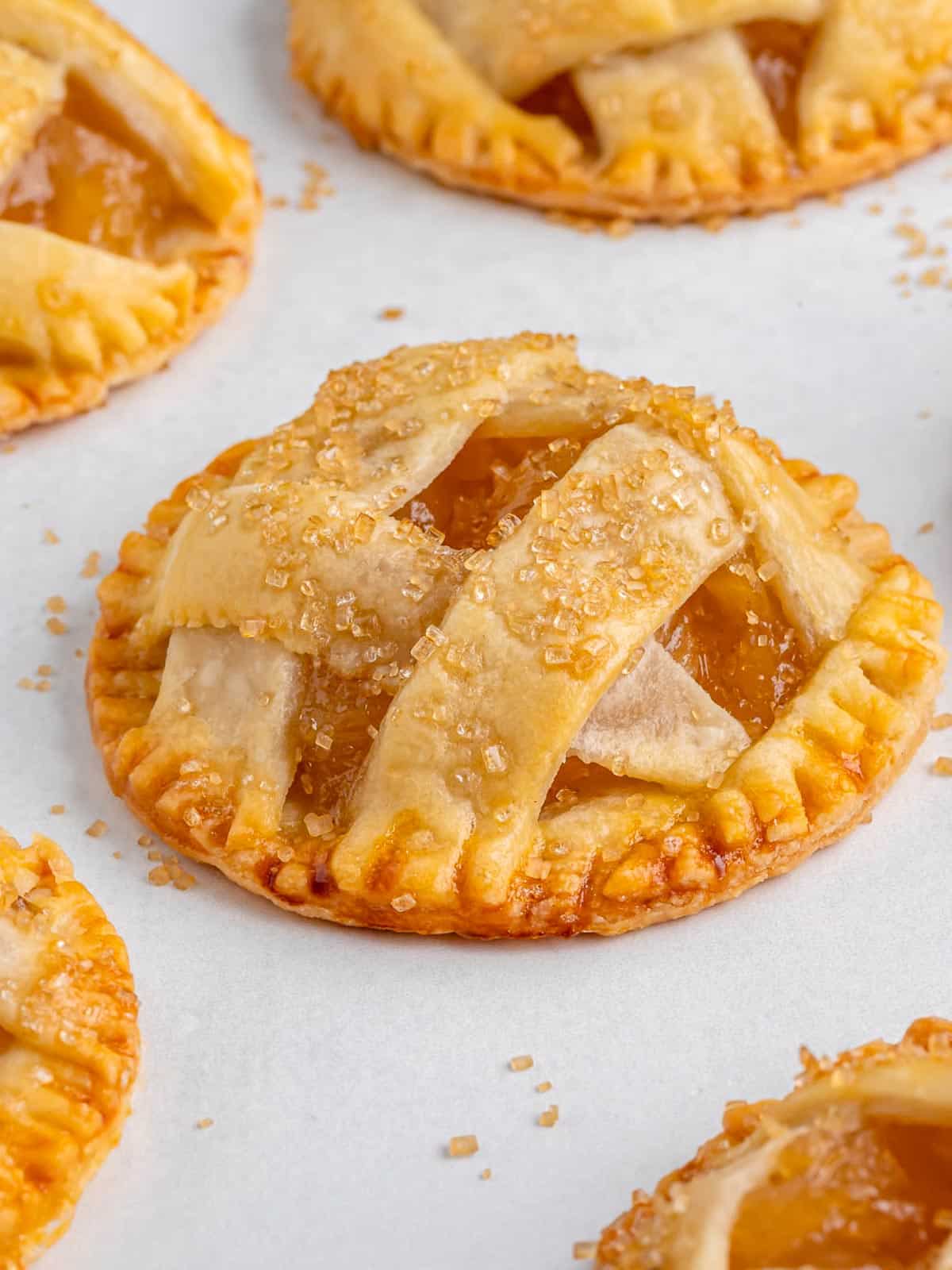 close up side angle of a mini apple pie