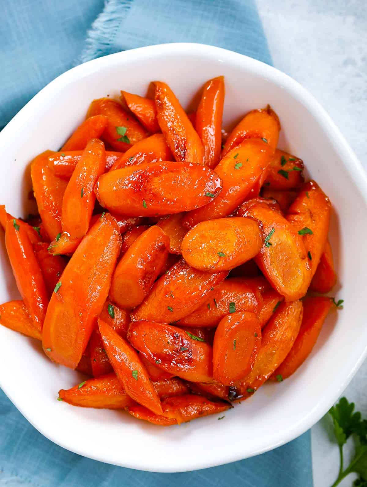 brown sugar glazed carrots on a white bowl