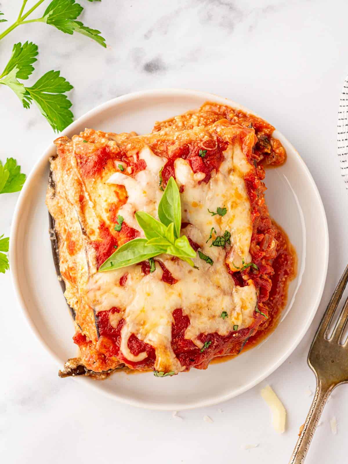 Piece of eggplant parmesan on a plate