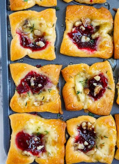 brie and cranberry bites drizzled with honey